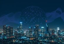 Understanding the Role of Internet Service Providers (ISPs) in Digital Piracy Modern city skyline with tall skyscrapers under a night blue sky